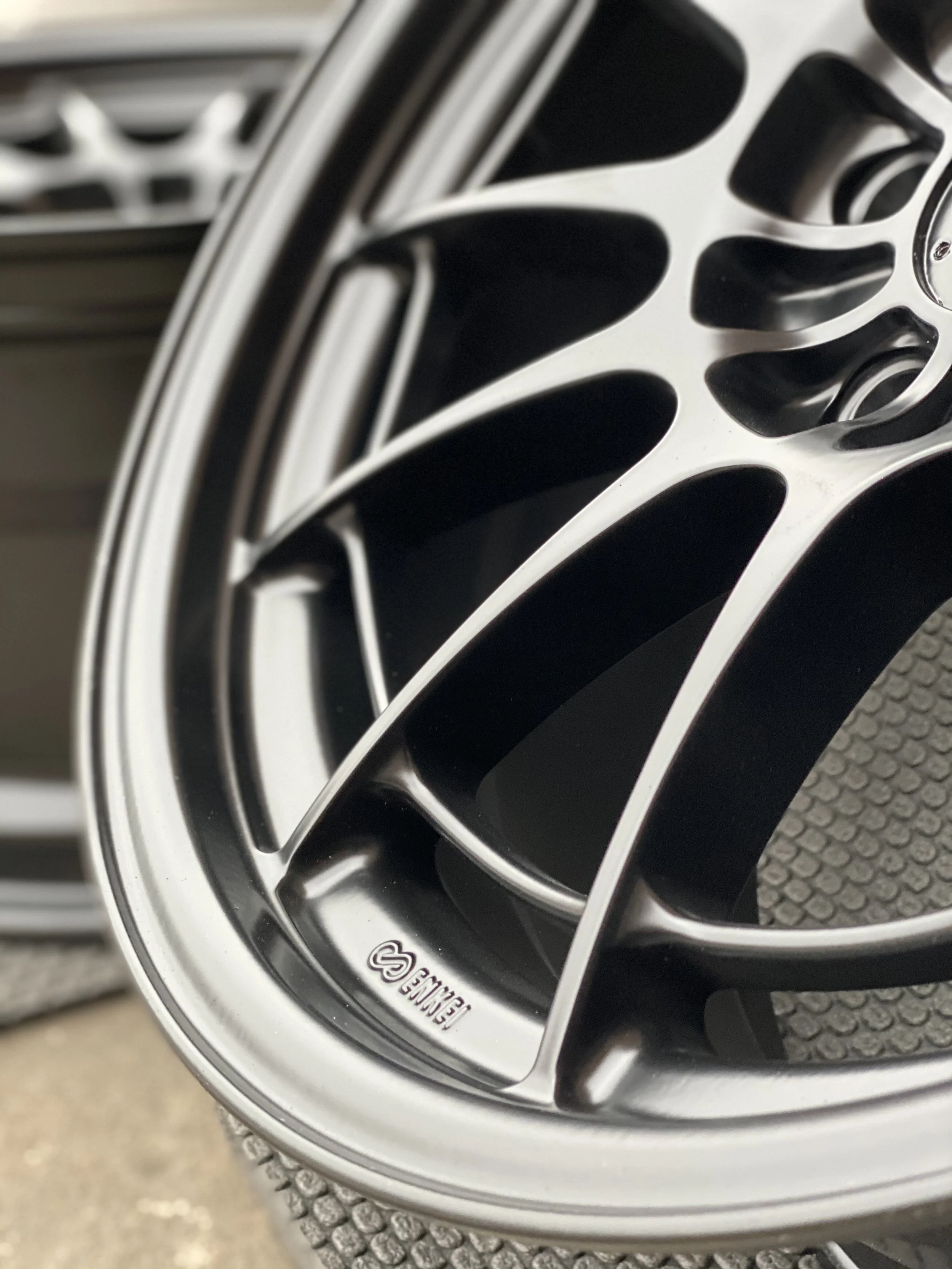 Close-up of a car wheel rim with a logo reading 'BBS' on it.