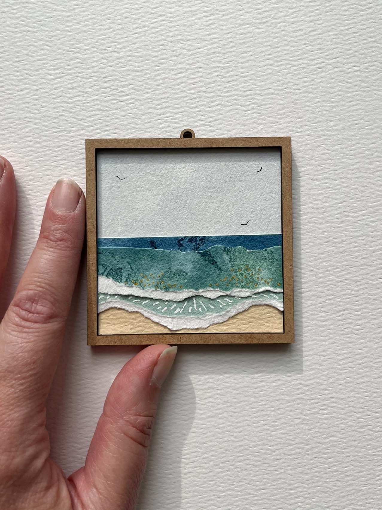 Mini_Shorebreak with hand.jpg