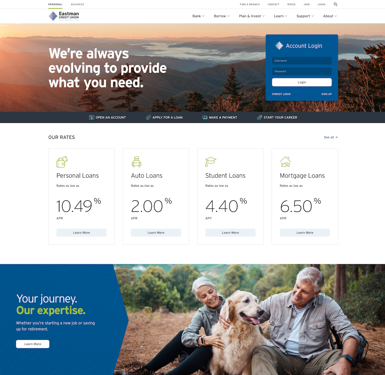 Eastman Credit Union's website homepage featuring a mountain landscape background, account login section, loan interest rates for personal, auto, student, and mortgage loans, and an image of two seniors with a dog in a forest setting.