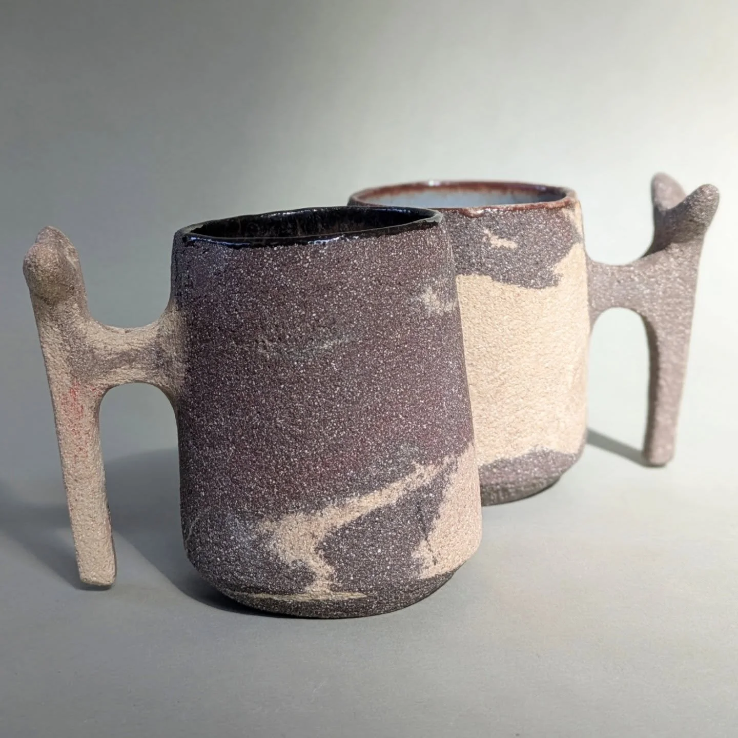 Marbled clay (#agateware ) mug duet with a sculptural thumb rest 
#ceramicmugs