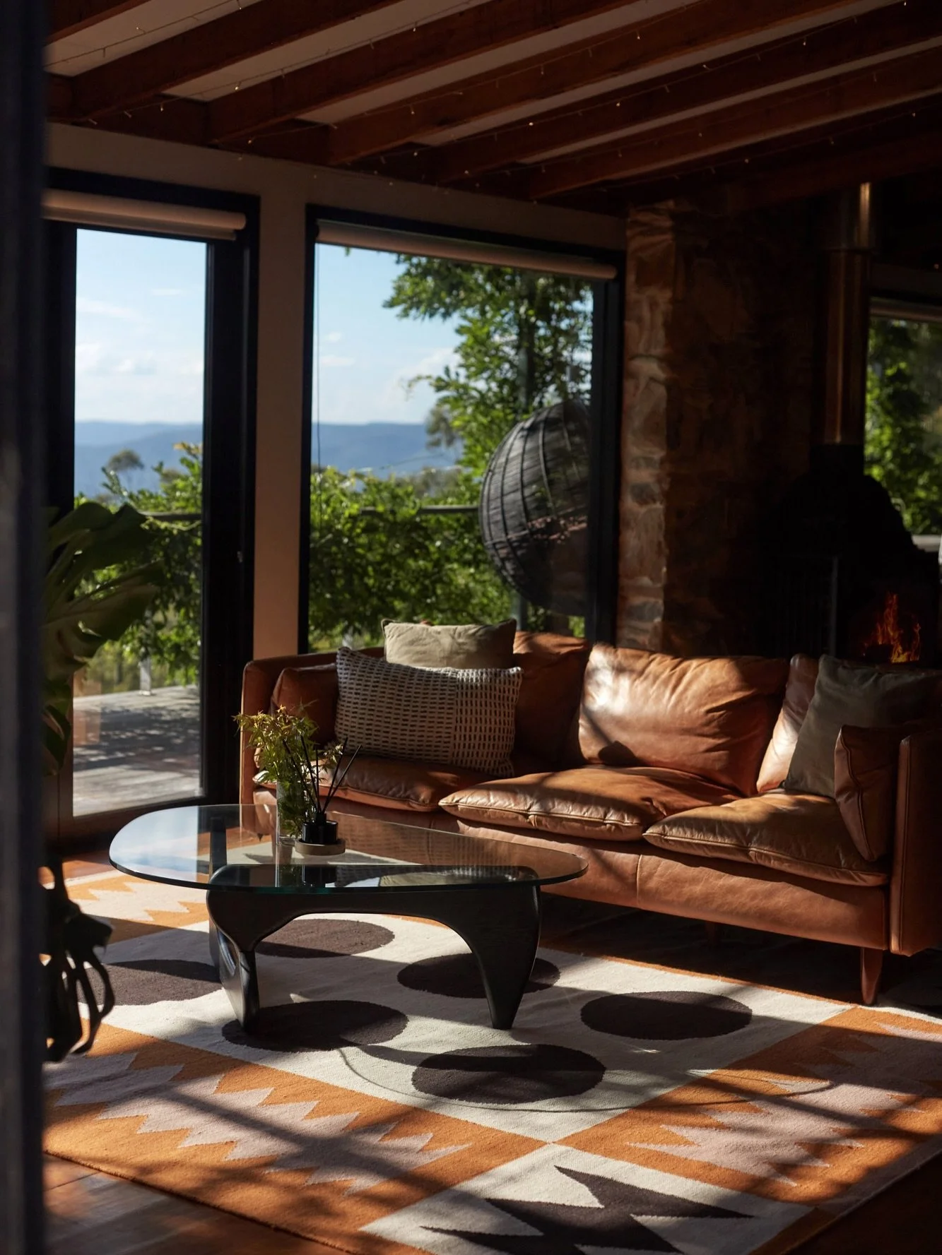 The Machinery Shed.

Raw timber beams from old railway lines.
Corten steel wrapped around it.
Glass pushed hard into the mountain view.

It could have stayed a working shed.
Instead it became front row seats to apple season.

Harvest starts this week