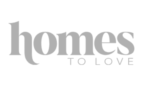 Logo with the word "homes" in large text and "to love" in smaller text underneath, all in gray on a black background.