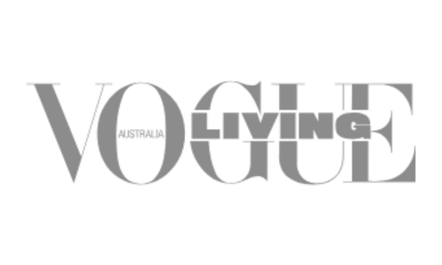Black and white Vogue logo with overlapping letters.