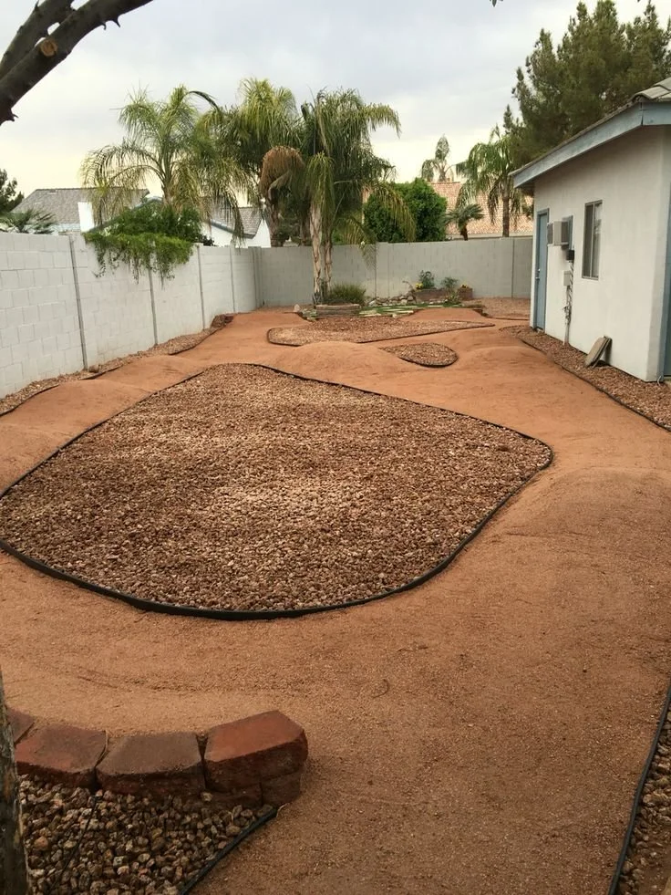 backyard pump track with landscaping 3.jpg