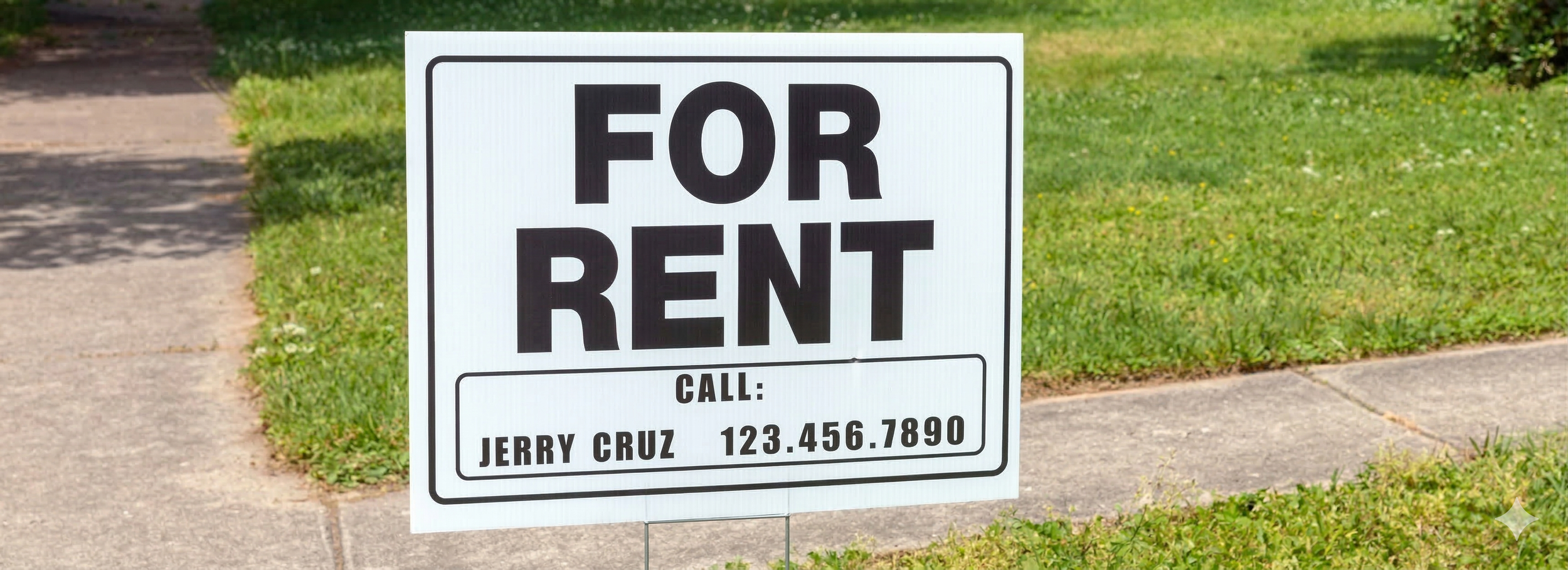 Modern multi-level rental home with landscaped yard and balcony under a bright blue sky