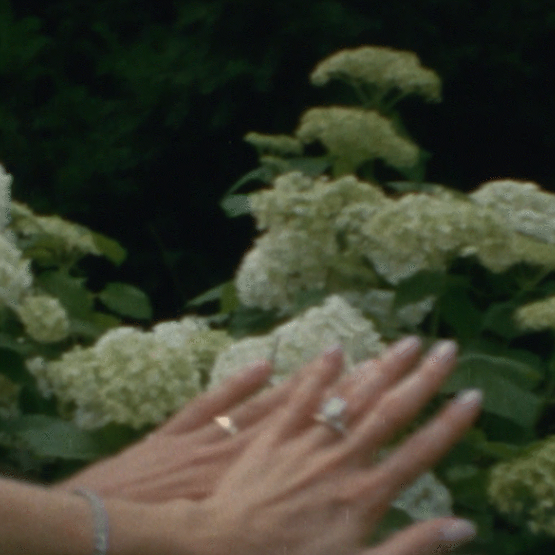 Close-up of a hand with rings, recorded by documentary wedding videographer.