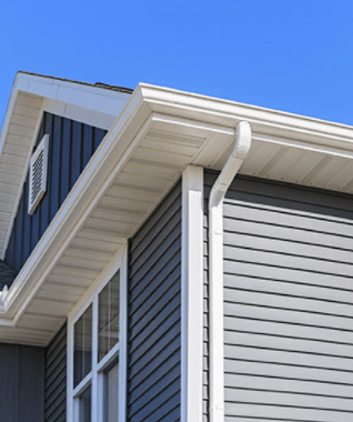 New gutters and downspouts