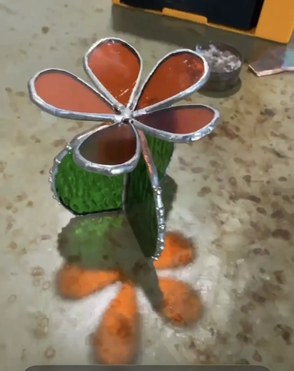 3d green cactus with a flower on top