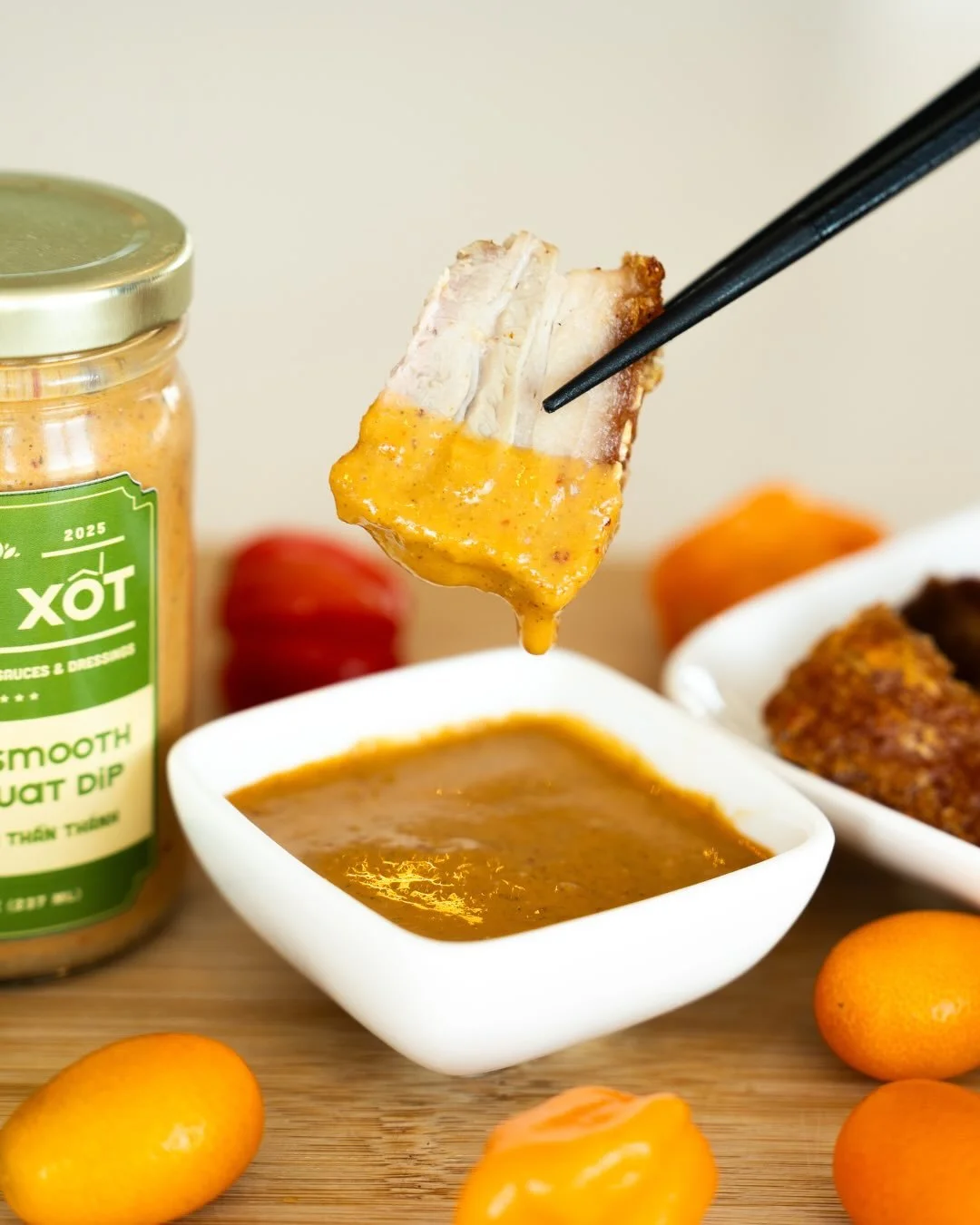 Sweet heat meets crispy pork belly &mdash; a match made in flavor heaven.

🔗 Tap the link in our bio to explore our full product lineup &amp; bundles!
.
.
.
.
.
#SieuXot #VietnameseSauce #VietnameseFlavors #VietnameseCuisine #SpicySmoothKumquatDip