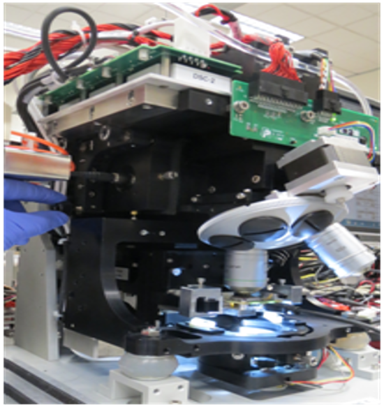 Close-up of the inside of a integrated digital microscope into the blood analyzer..