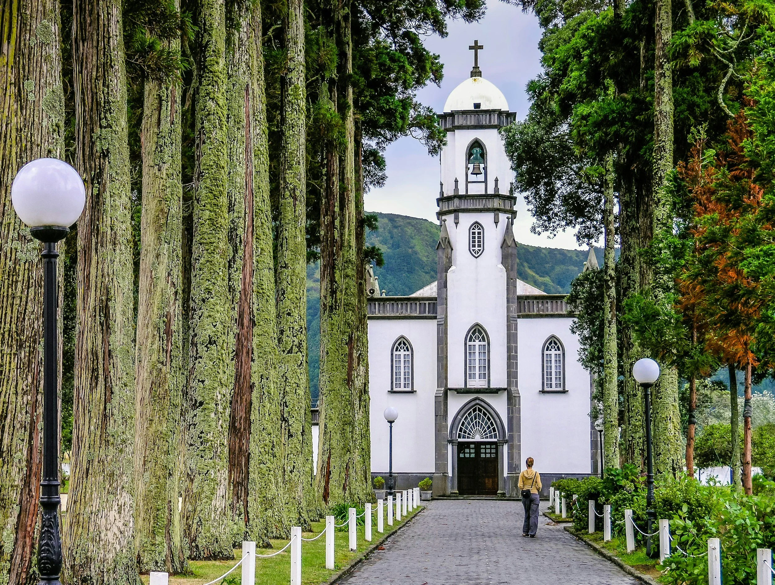 women walking down street to church