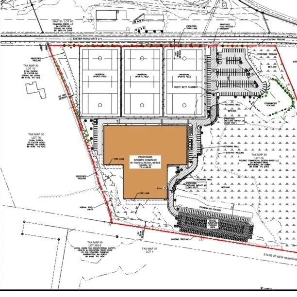 Site development plan with sports complex, athletic fields, parking lot, fire lanes, and surrounding landscaping.