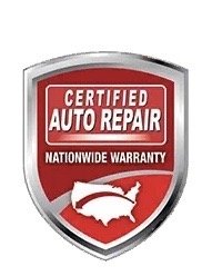 Badge with red and silver border, displaying 'Certified Auto Repair' and 'Nationwide Warranty' with a fish symbol inside.