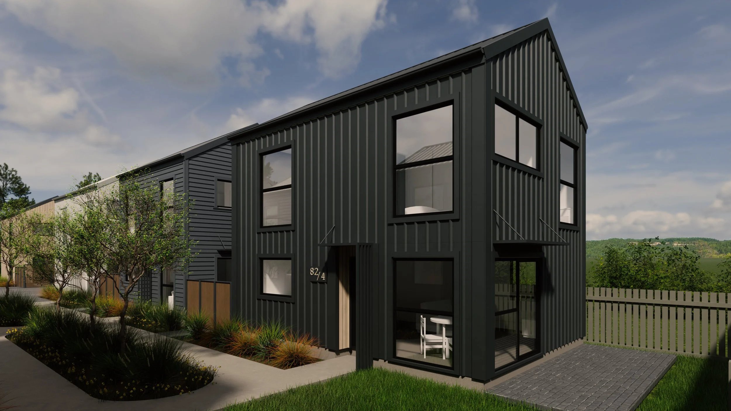 Street elevation of 8 lot subdivision with modern townhouse-style dwellings and varied cladding