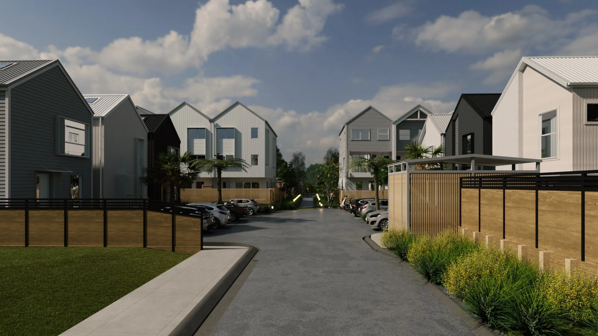Central access lane through townhouse development with planting and parking on both sides