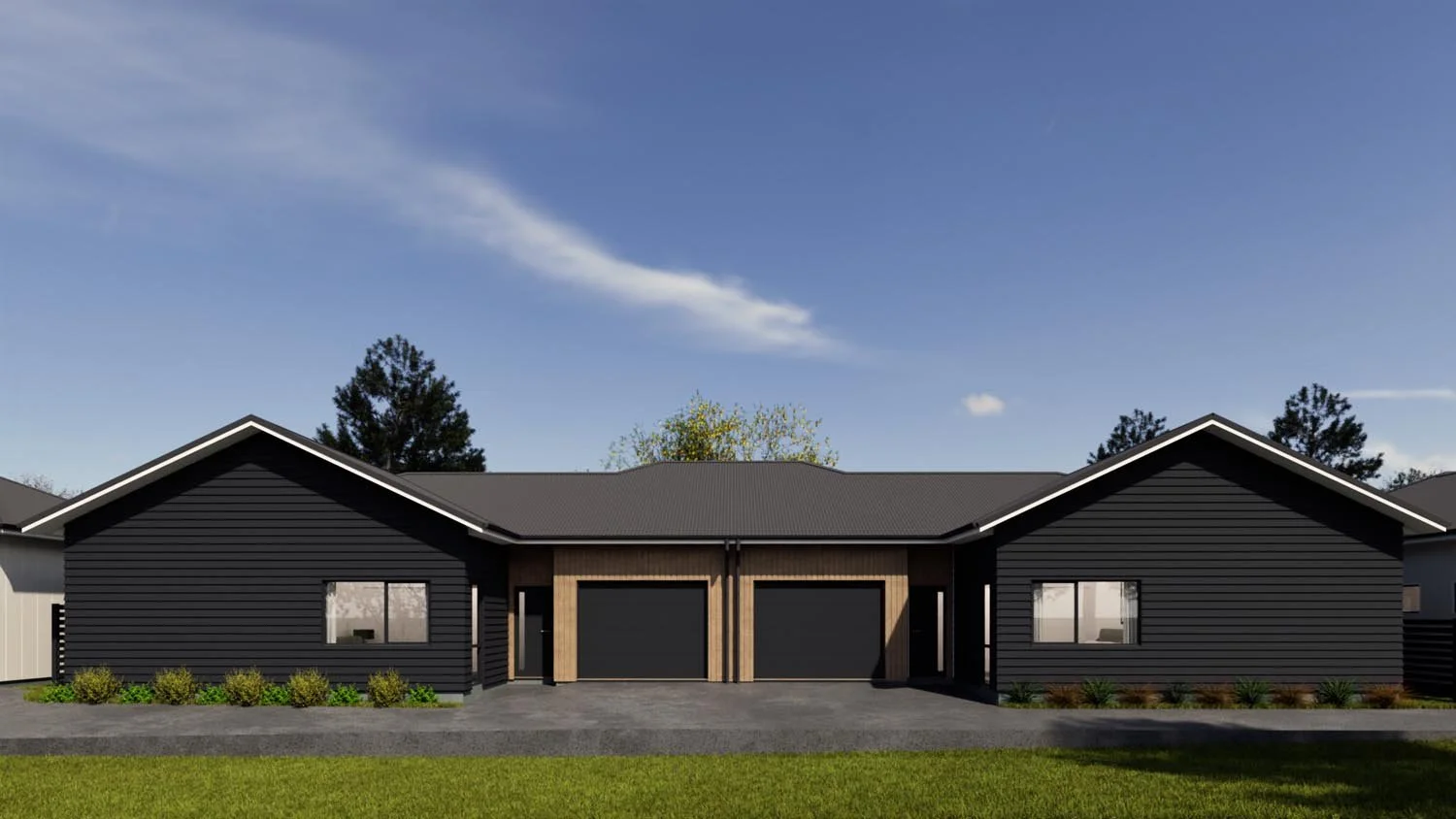 Front view of modern duplex homes in residential subdivision with symmetrical design