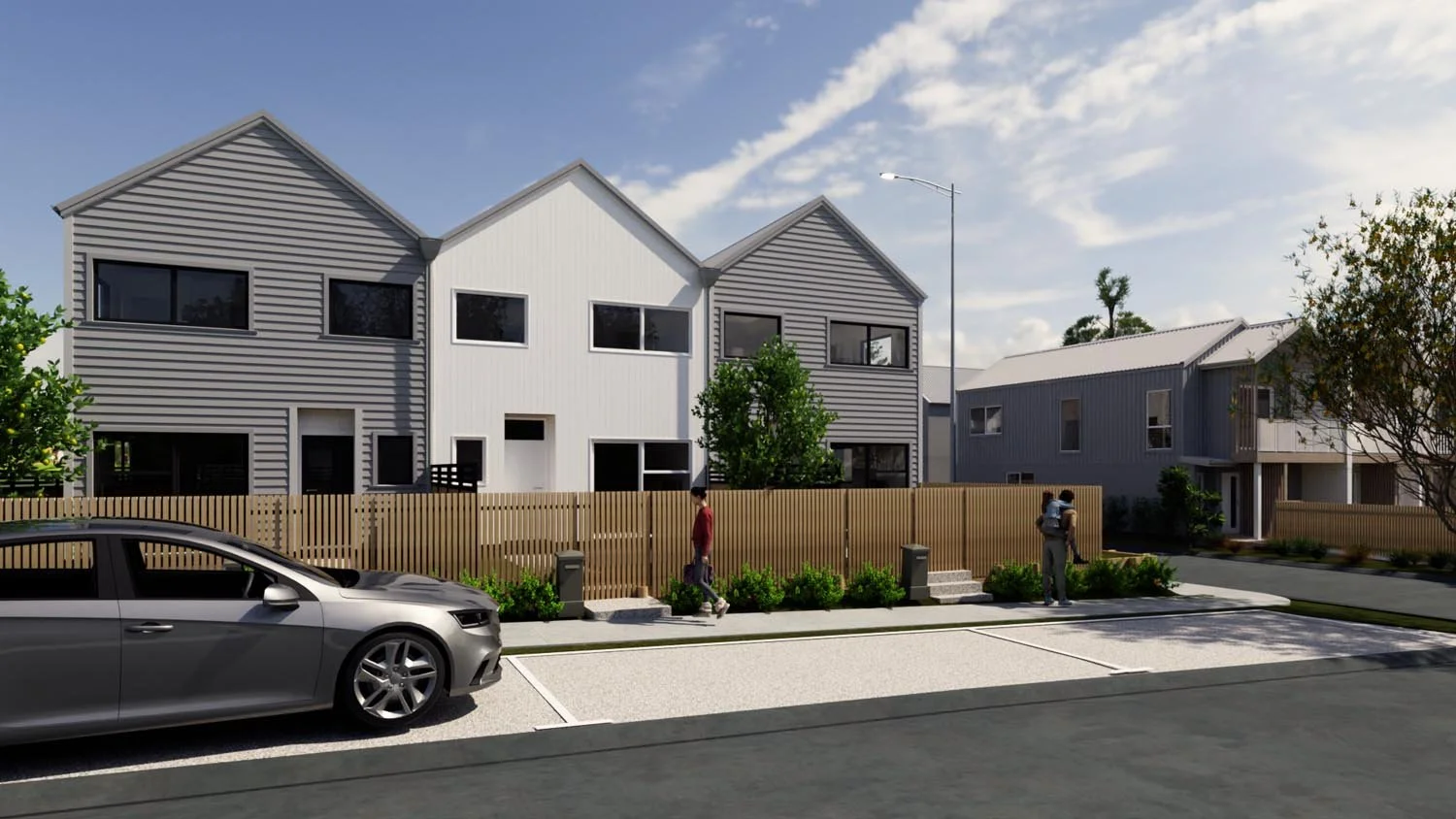 Contemporary terrace housing with contrasting cladding and vertical windows