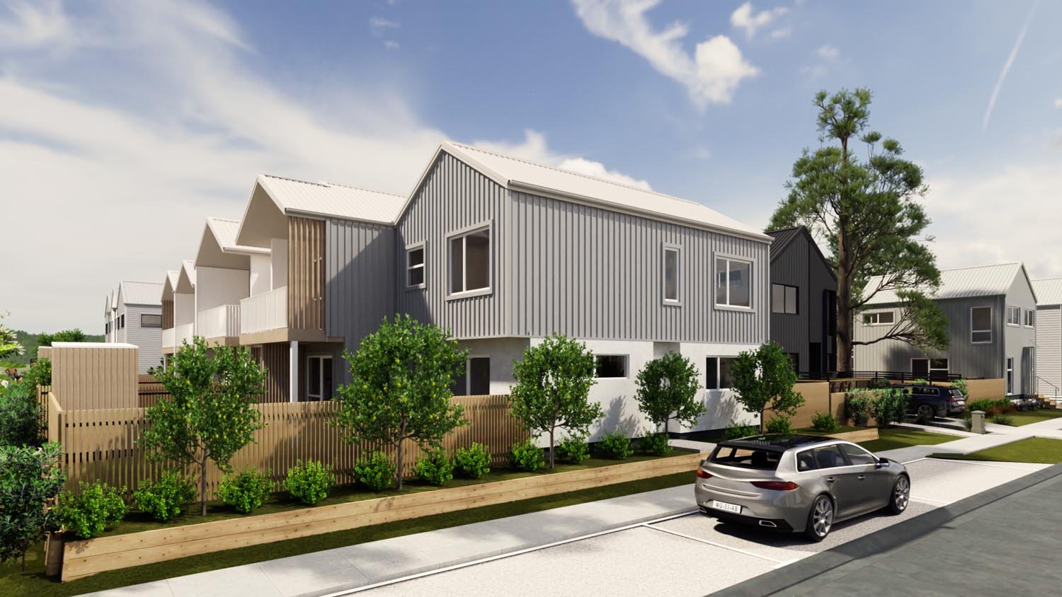 Duplex townhouse development with garages and clean modern street frontage