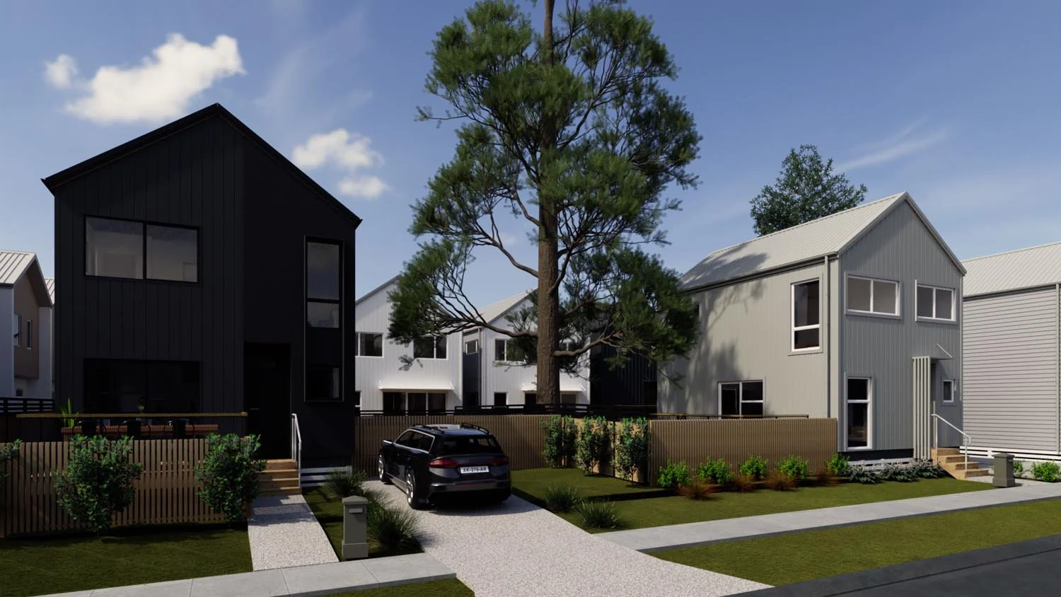 Townhouse development with central tree and landscaped communal space