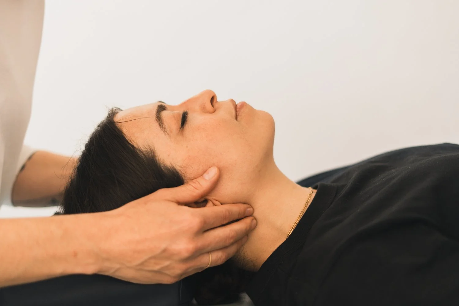 Sitting All Day Is Quietly Wrecking Your Back. Here's How Massage Therapy Helps