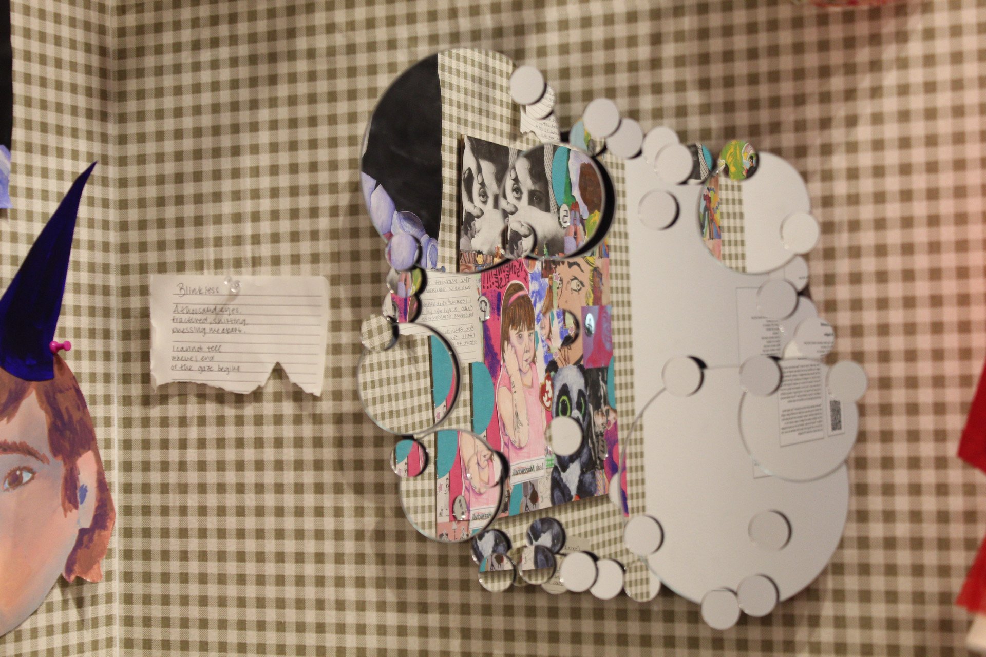 "Blinkless" is a mirror installation piece.