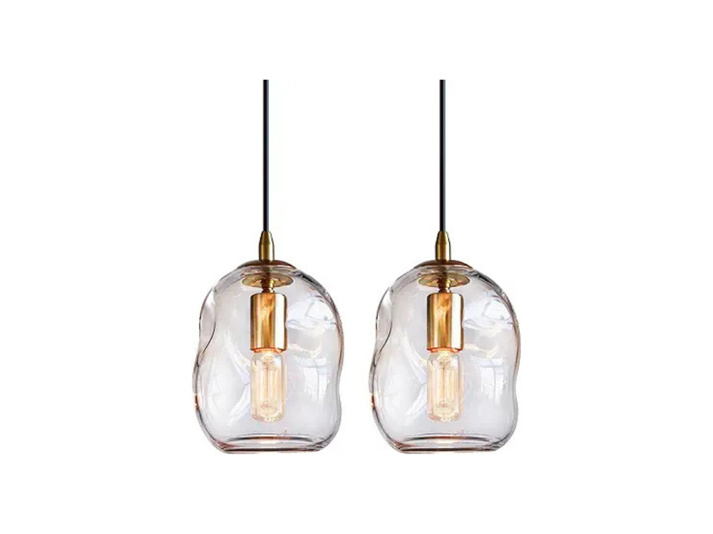 Globe pendant light with brass accents for designer kitchen and dining spaces