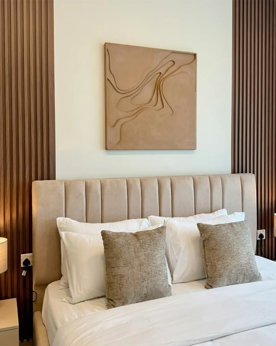 Elegant master bedroom with large windows in Business Bay 22nd floor apartment, designed for comfortable long-term living in Dubai.