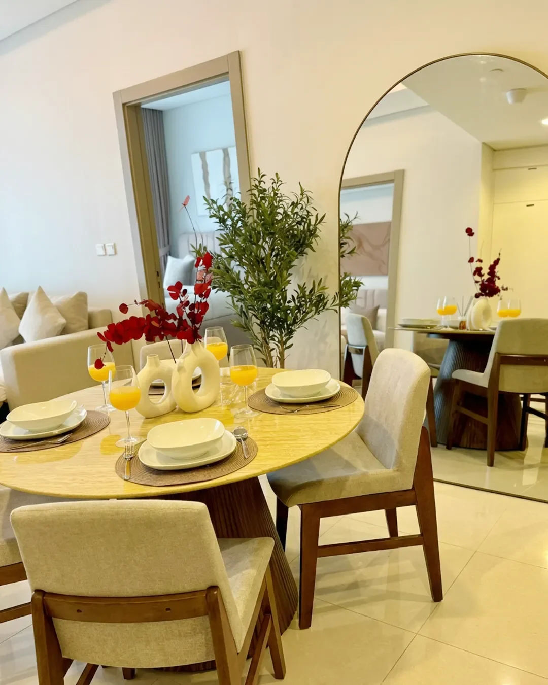 Modern dining space connected to living area in 2-bedroom apartment for rent in Business Bay, Dubai.