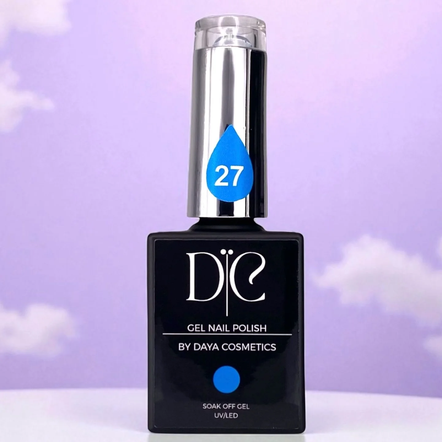 A black bottle of Dije gel nail polish with a silver cap and a blue droplet icon with the number 27 on it, set against a purple sky background.