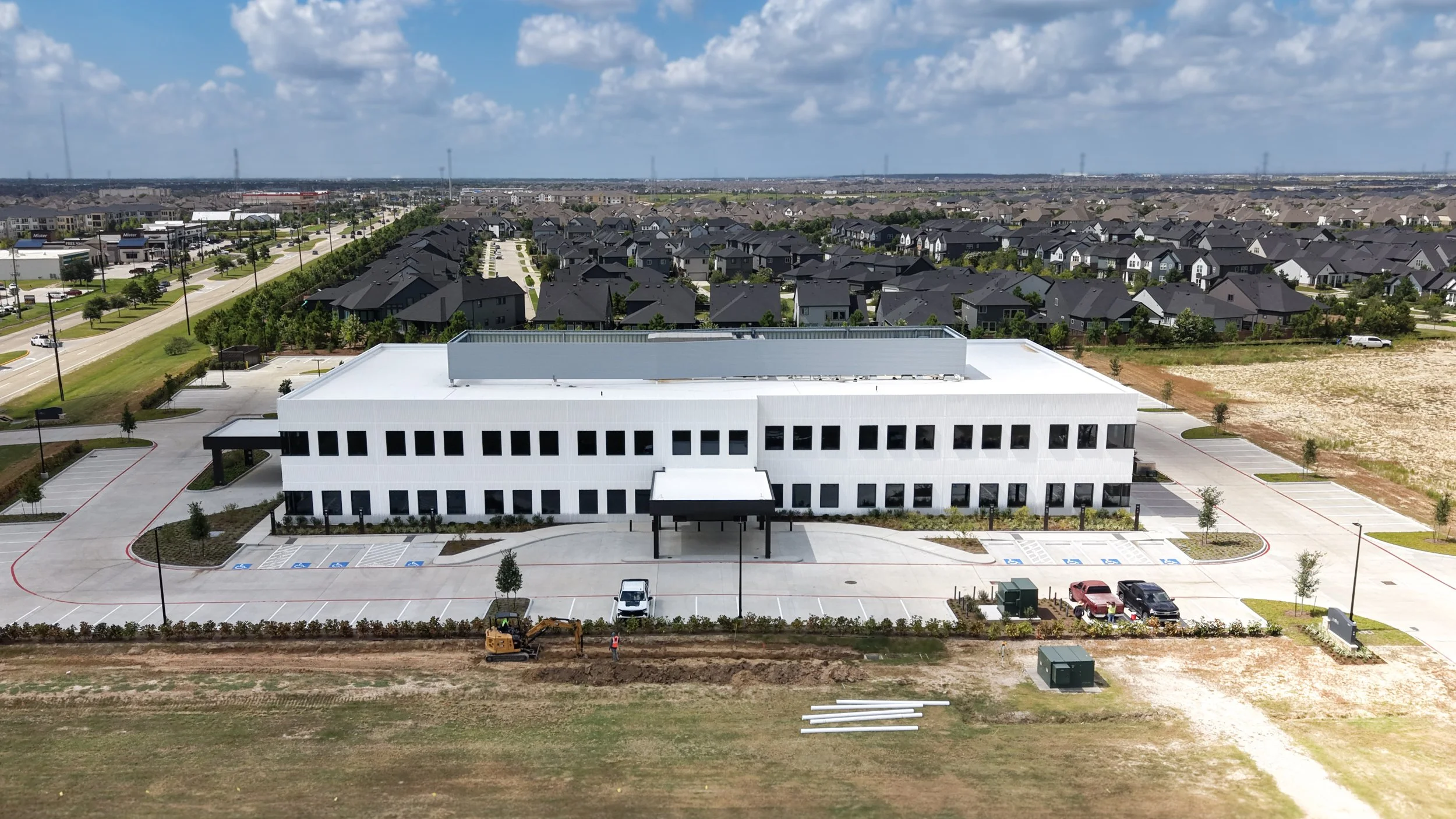 Memorial Hermann office building near Tuckerton and Fry in Cypress, TX, with final sitework and landscaping underway
