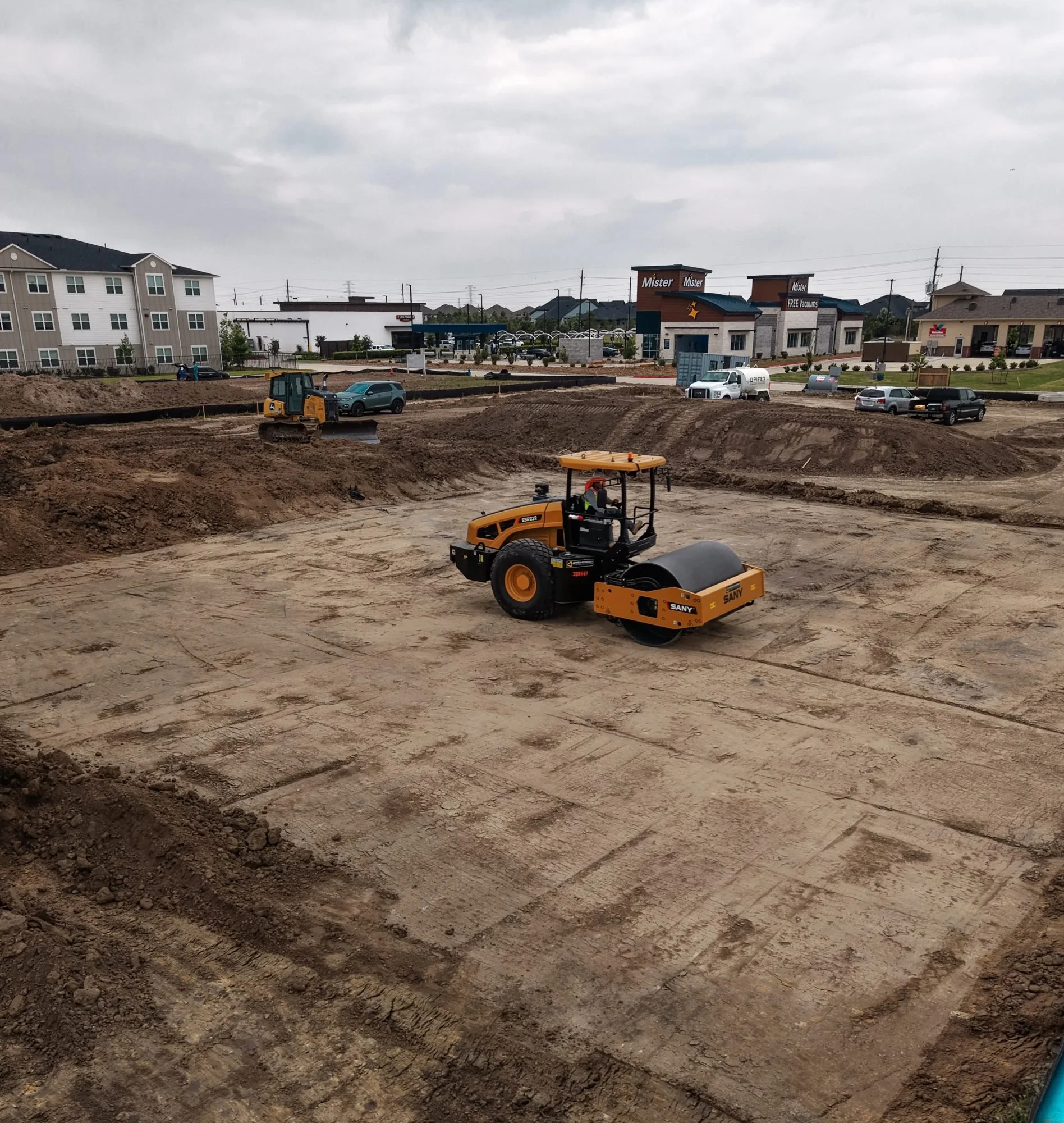 site-grading-compaction-roller-drone-photo.jpg