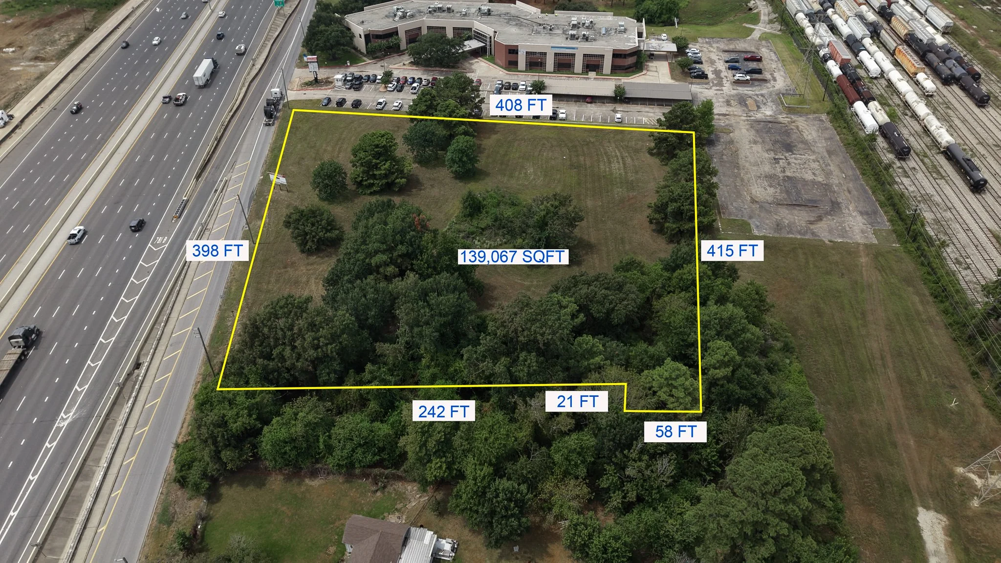 Aerial view of the lot with its boundary outlined and dimensions labeled