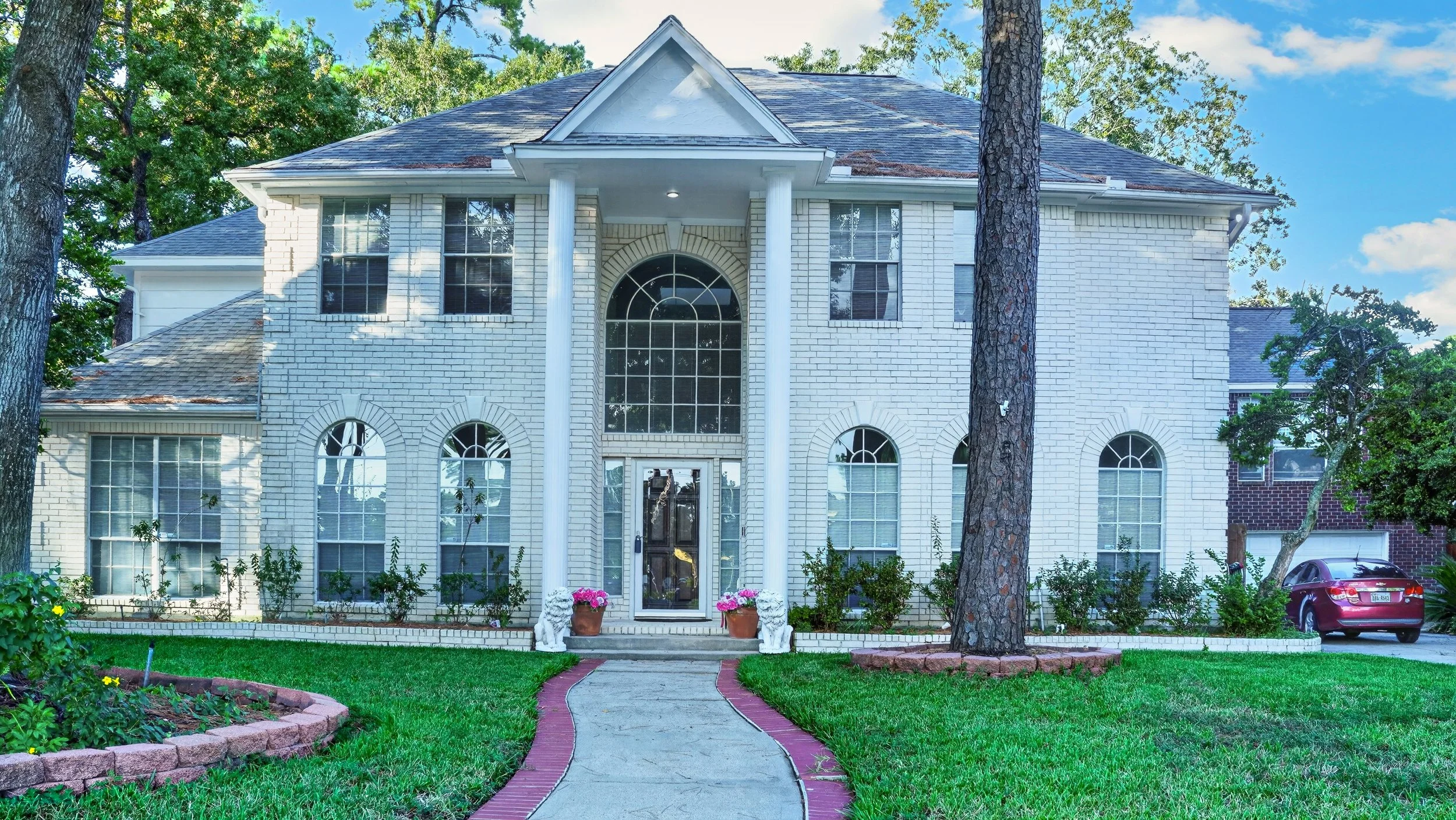 Front photograph of a real estate property in Cypress, TX