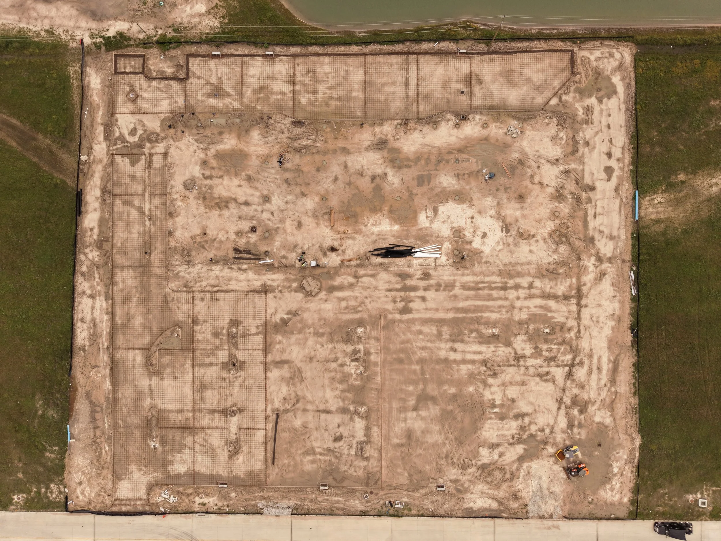 Nadir aerial view of a graded construction site in Cypress, TX