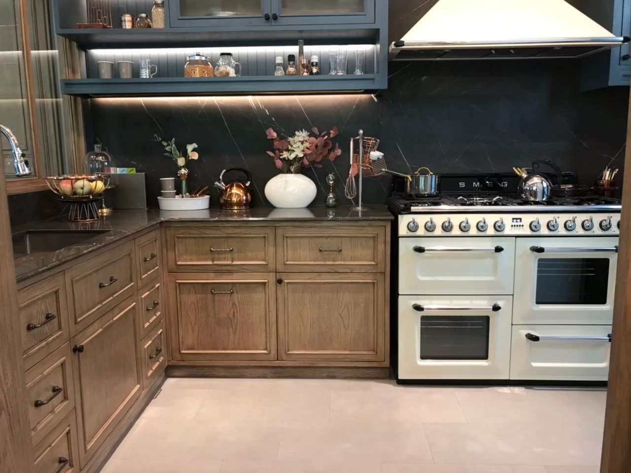 Residential kitchen with custom cabinet hardware and wooden cabinetry – Before Closet