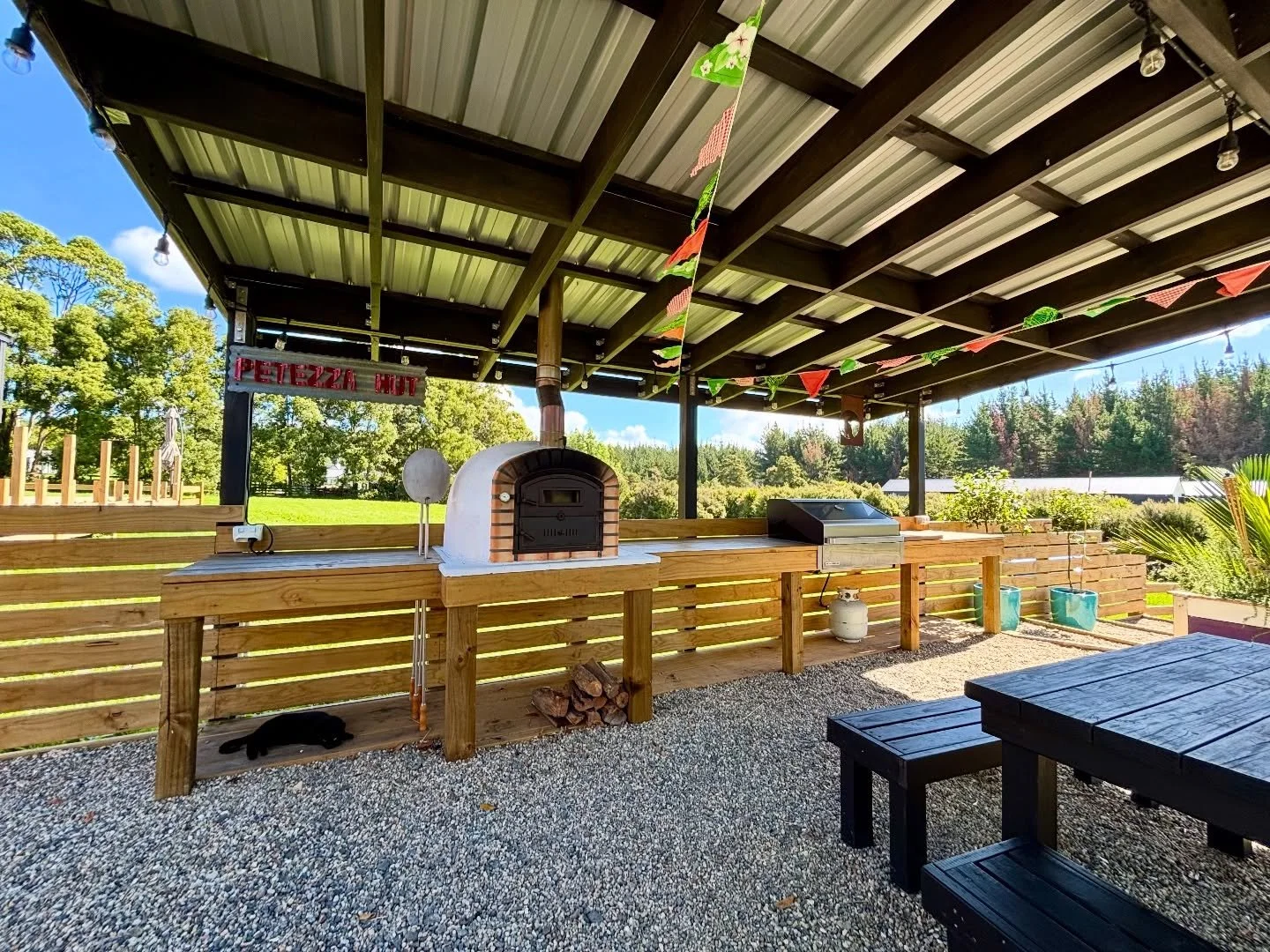 I made this outdoor area for my parents last Christmas. And what a difference it has made to their property, they use the pizza oven and bbq most weekends and have a large area to host no matter the weather, perfect for our kiwi summers.. If you are 