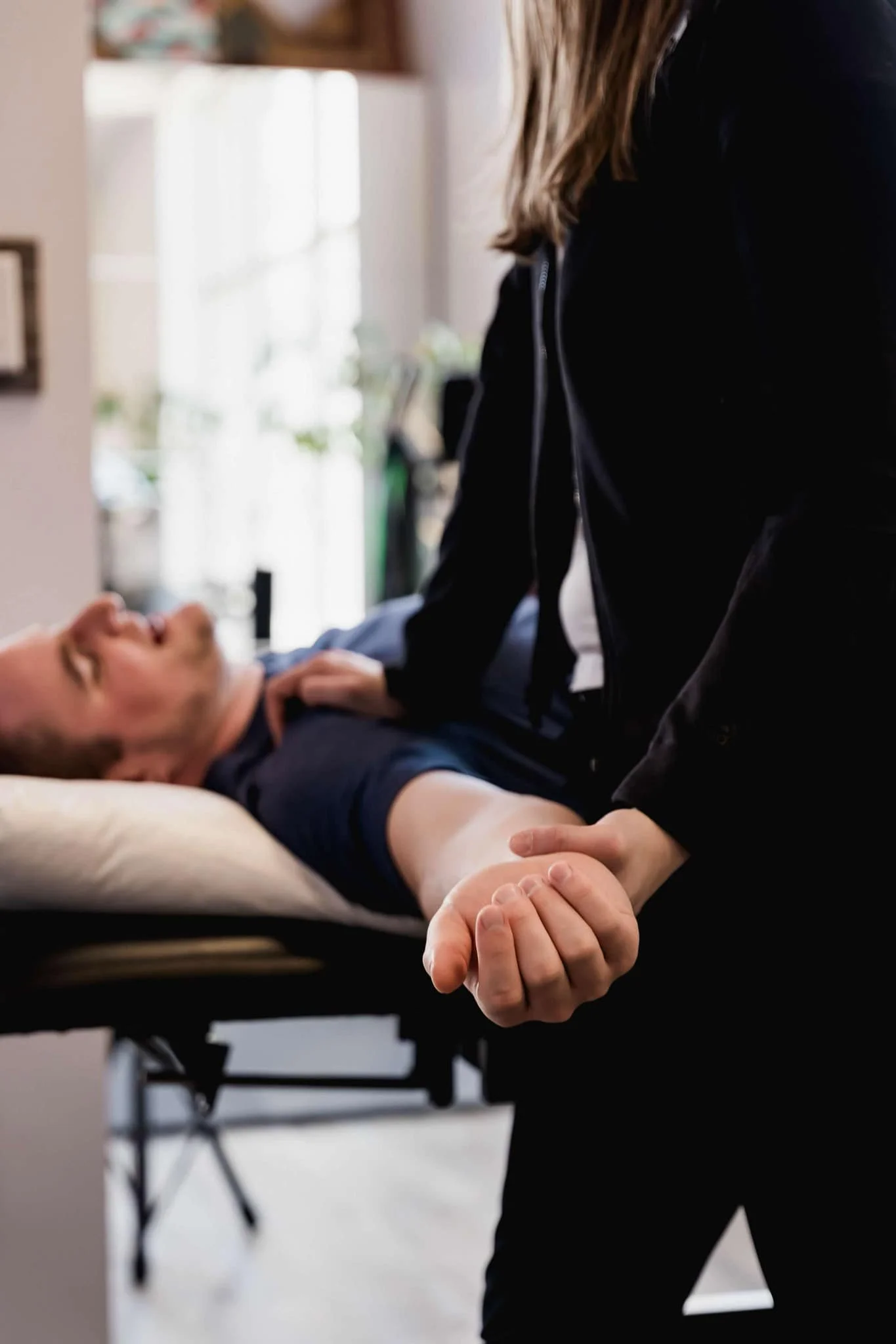 Athletic Therapist Jessica doing massage in winnipeg