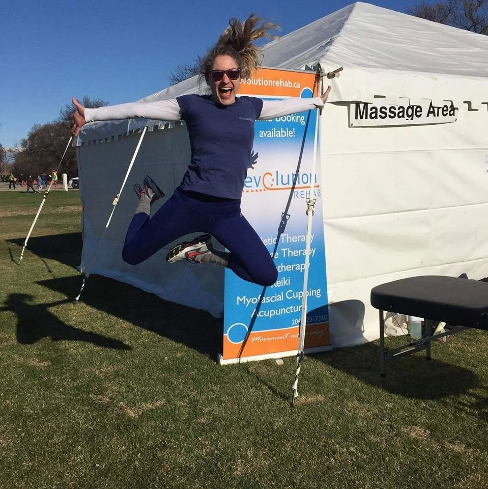 Therapist Nikki jumping in the air 