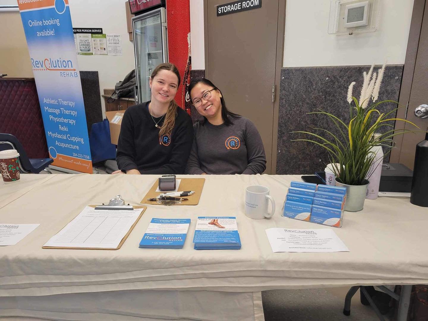 Alecs and Jessica sitting at a table