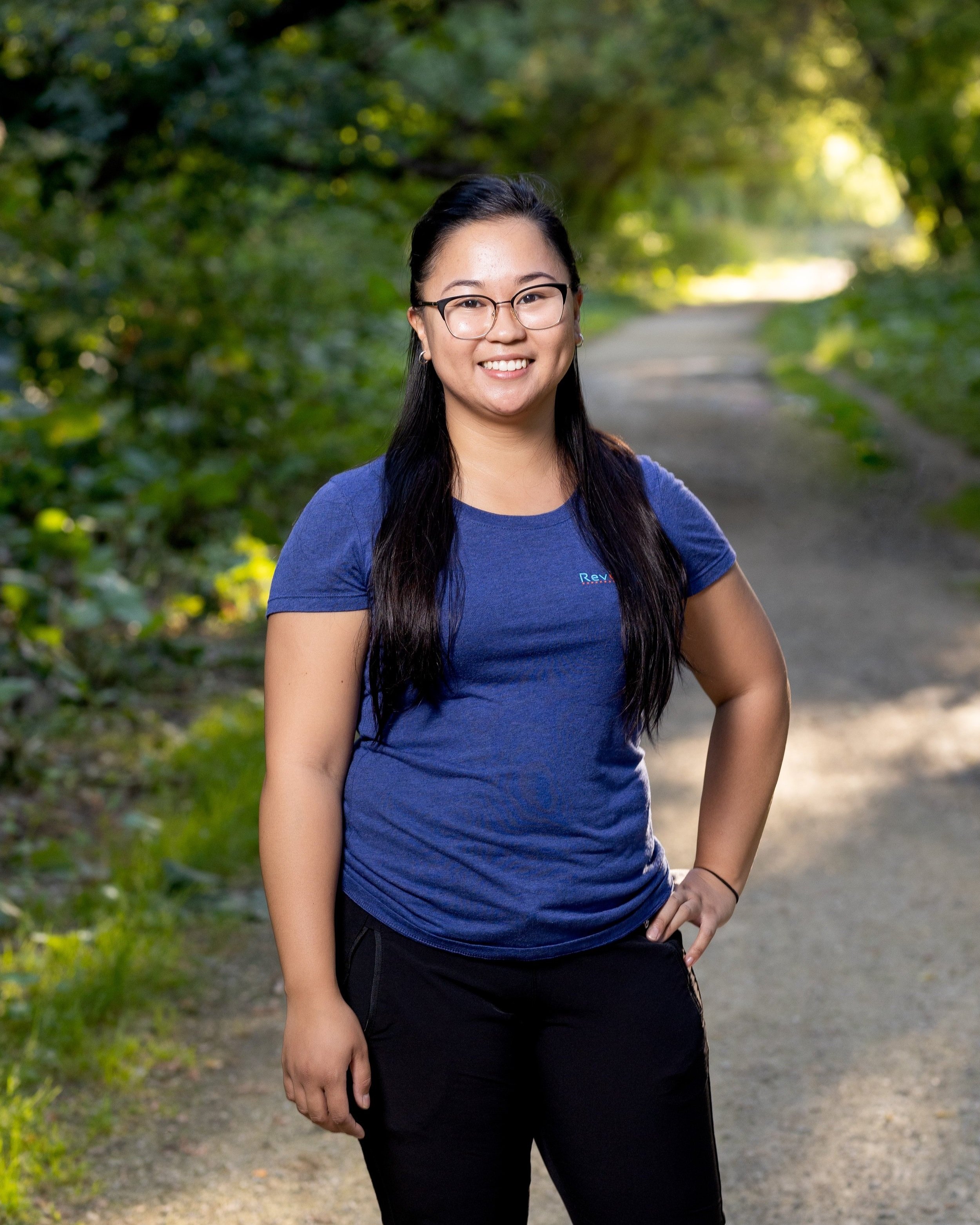 Athletic Therapist, Alecs Baraga, standing outside.