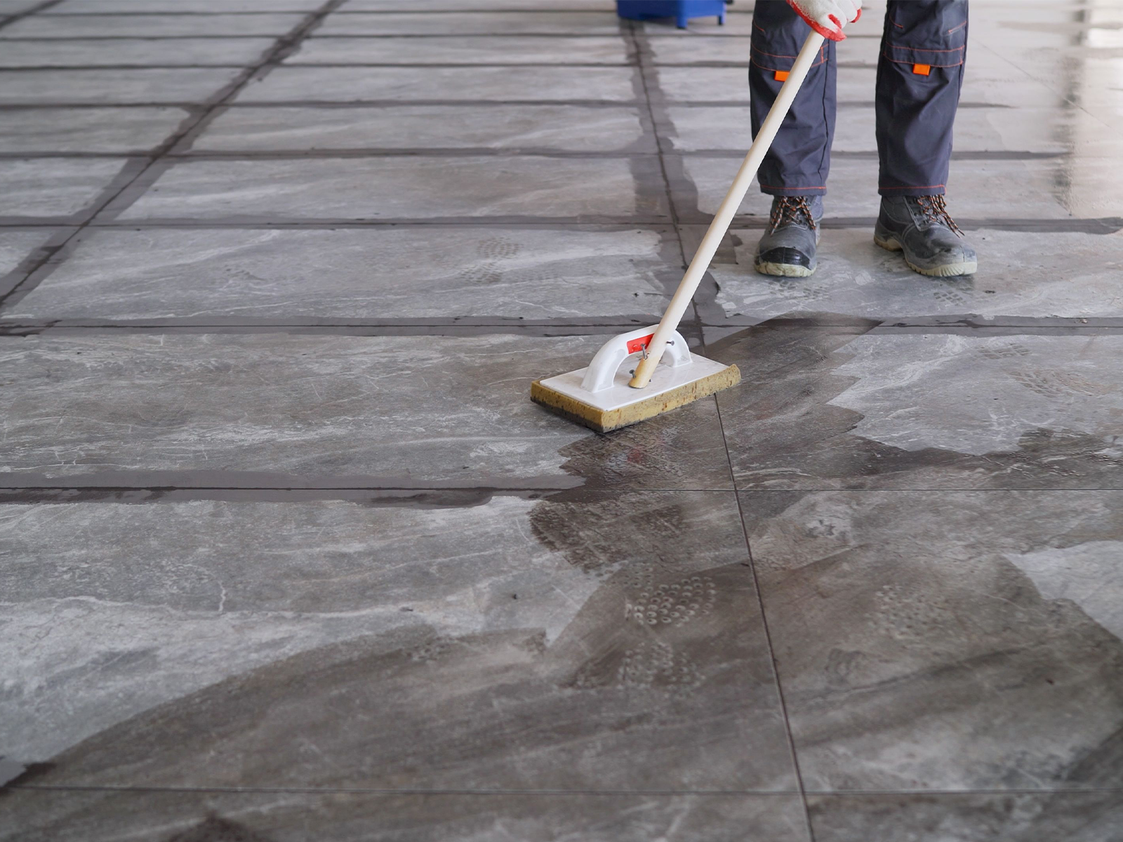 Builders Final Clean - cleaning grout from tiles for project completed in Brisbane.