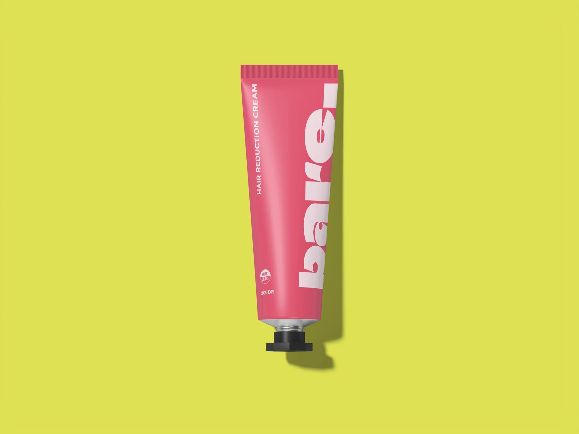 Pink tube of hair reduction cream labeled 'Hair Reduction Cream' on a bright yellow background.