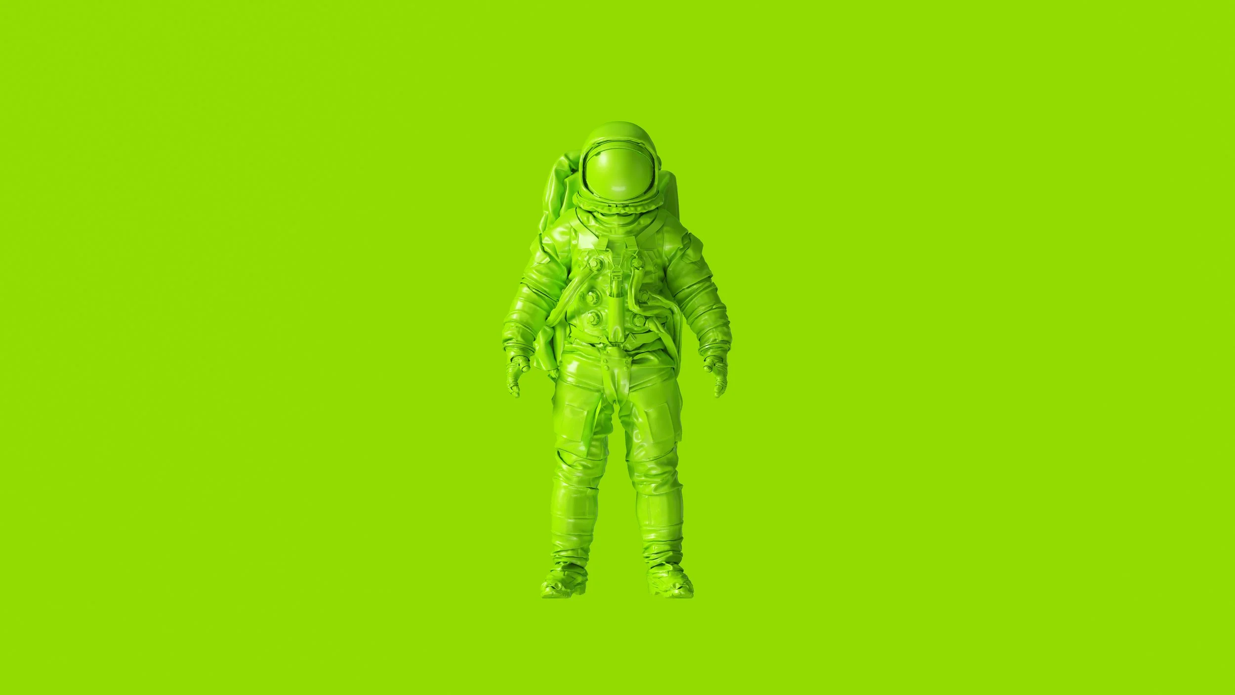 A person dressed in a bright green astronaut suit standing against a matching green background.