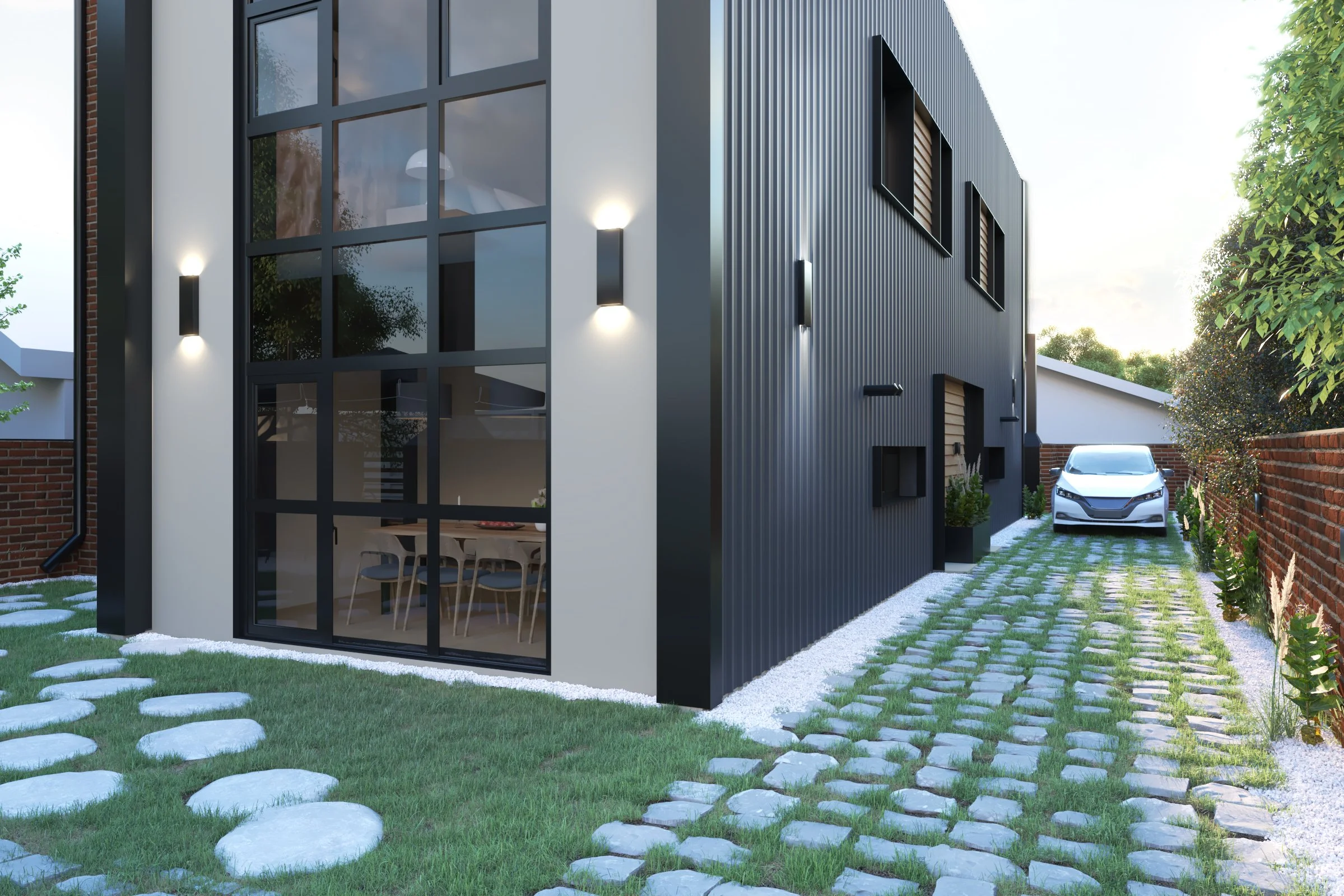 Modern house exterior with large glass window, black metal siding, a driveway with a car, landscaped yard, and pathway stones.