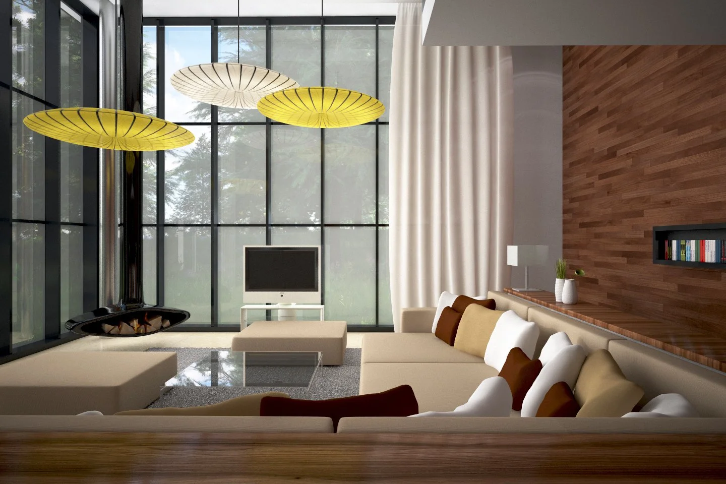 Modern living room with large glass windows, white curtains, beige sectional sofa with brown and white pillows, small white table with a lamp, television on a white stand, three hanging pendant lights with yellow and white shades, wood-paneled accent wall with bookshelf, and a black fireplace.