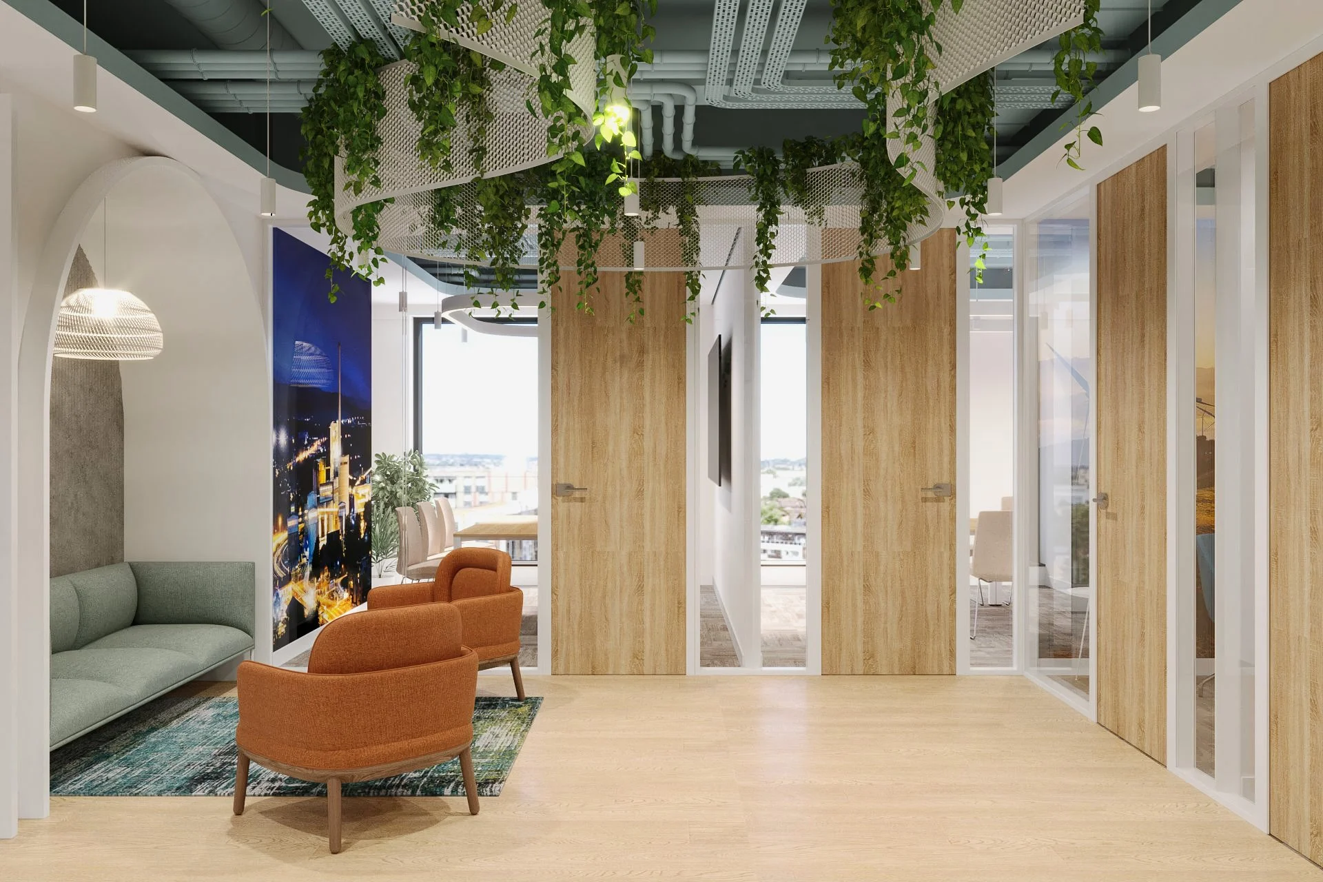 Modern office lounge with green and orange chairs, a soft rug, a large cityscape wall art, and a ceiling with hanging greenery and modern lighting fixtures.
