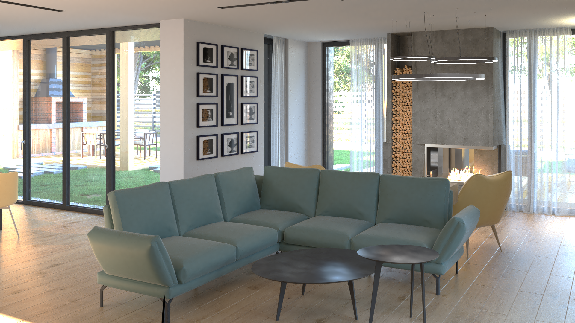 Modern living room with large L-shaped teal sofa, black nested coffee tables, yellow armchair, wood floor, large glass sliding doors to outdoor patio, wall art, and a fireplace with stacked firewood and a fire burning.