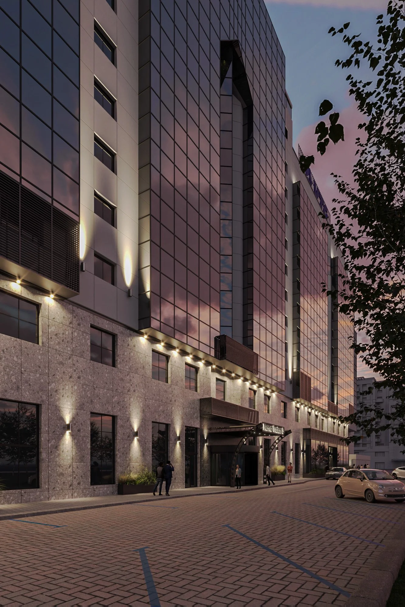 Modern hotel building at dusk with reflective glass windows, exterior lighting, and a small parking lot with a few cars and people walking near the entrance.