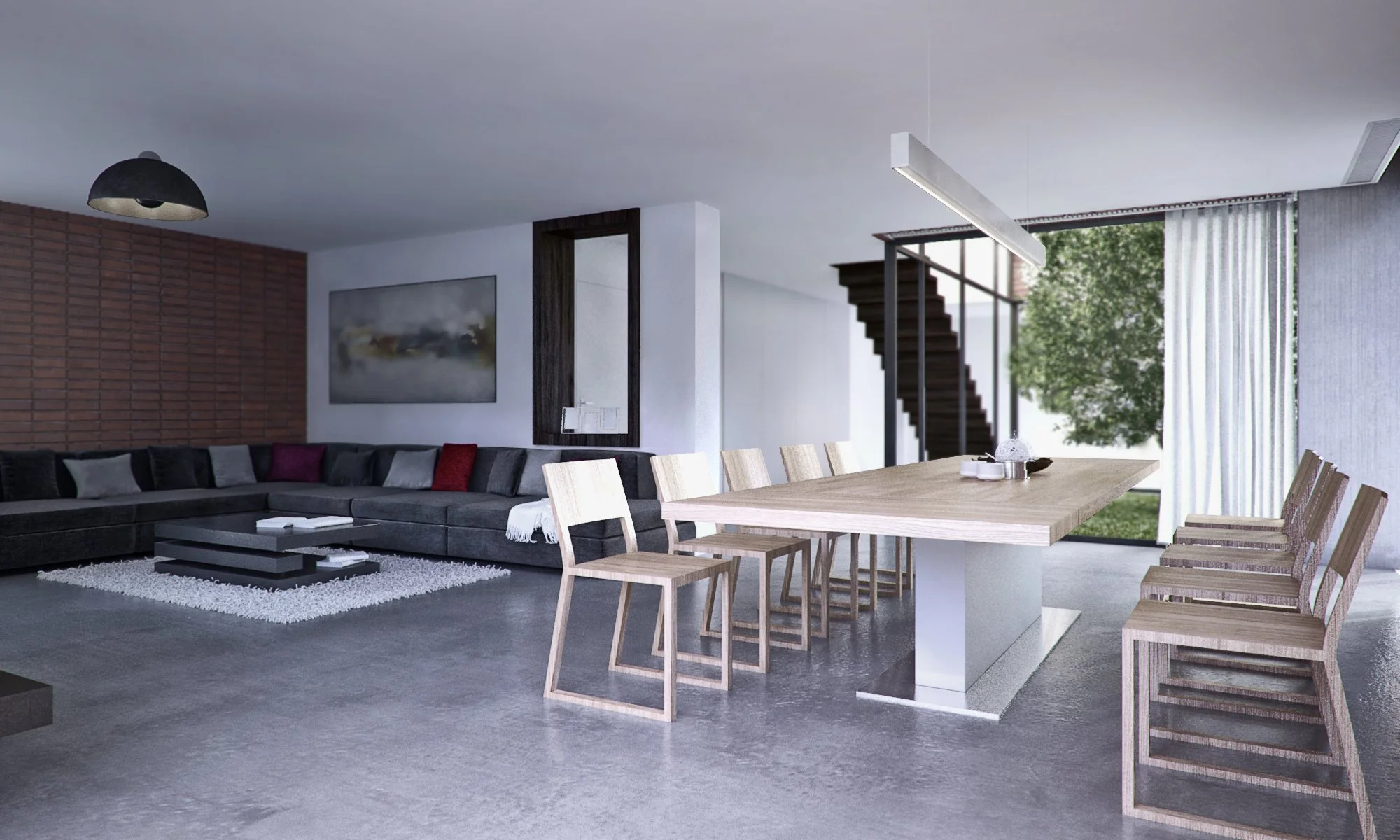 Modern living and dining room with black sectional sofa, colorful pillows, light wood dining table with matching chairs, large window with curtains, and staircase in the background.