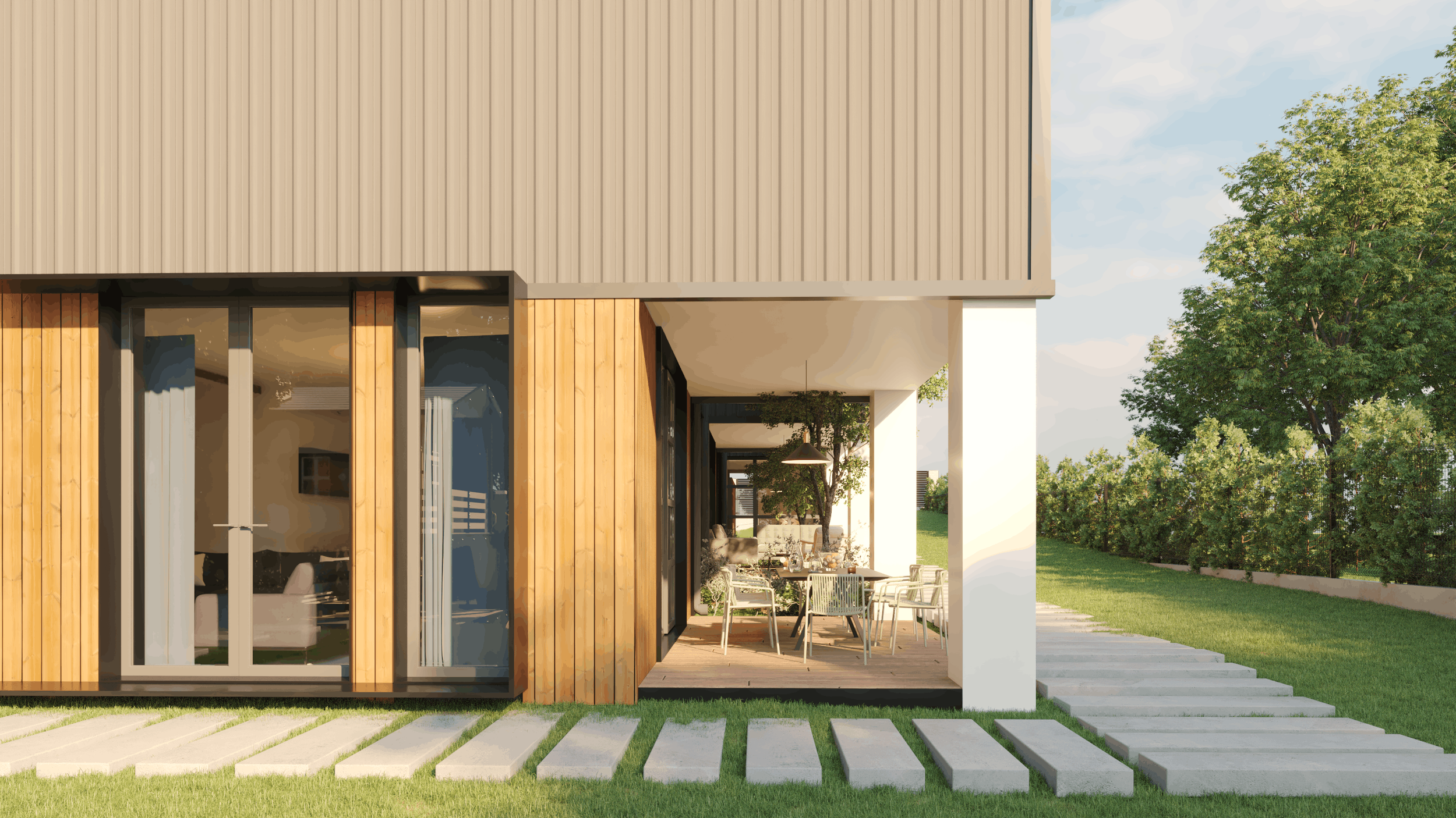 Modern house exterior with wooden and gray siding, large glass doors, and a covered outdoor dining area on a sunny day with green lawn and trees.